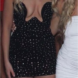 black sparkle low cut dress